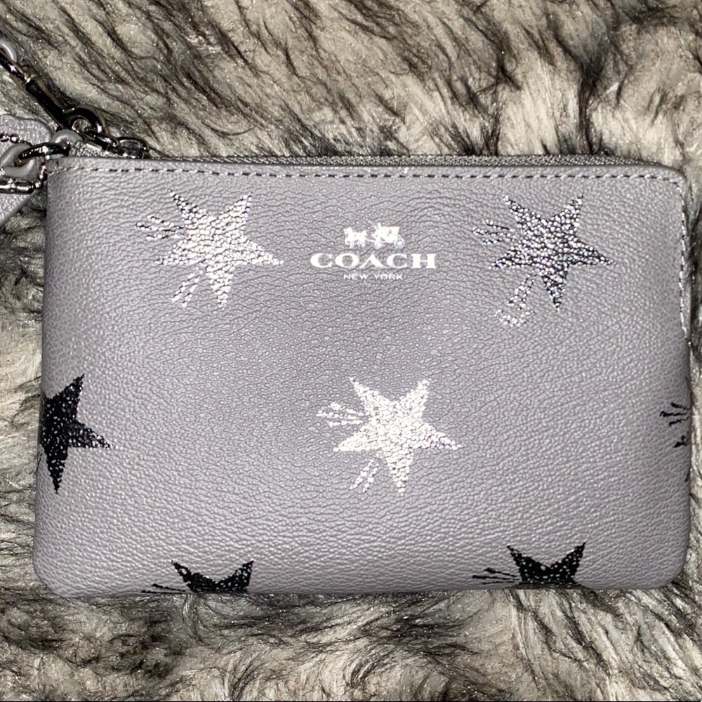 ⭐️⭐️new Coach wristlet with stars⭐️⭐️